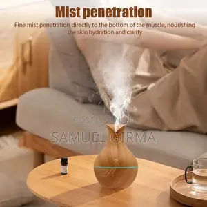 Photo - Ultrasonic Mini Aroma Humidifier