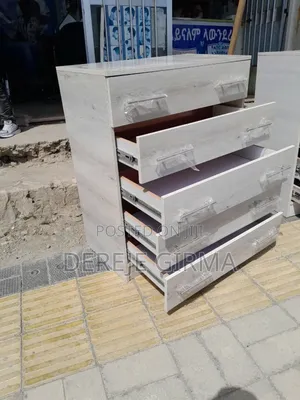 Photo - ላምኔትድ ሸሚዝ ኮሞ