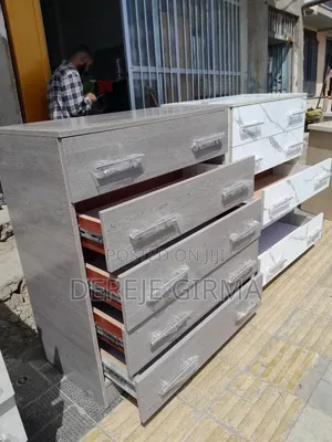 Photo - ላምኔትድ የሸሚዝ ኮሞ