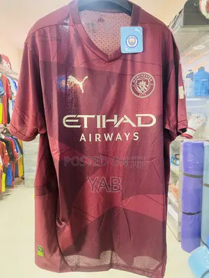 Burgundy Man City Kit