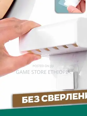 ተለጣፊ የጥርስ ቡርሽ ማስቀመጫ Wall-Mounted Holder