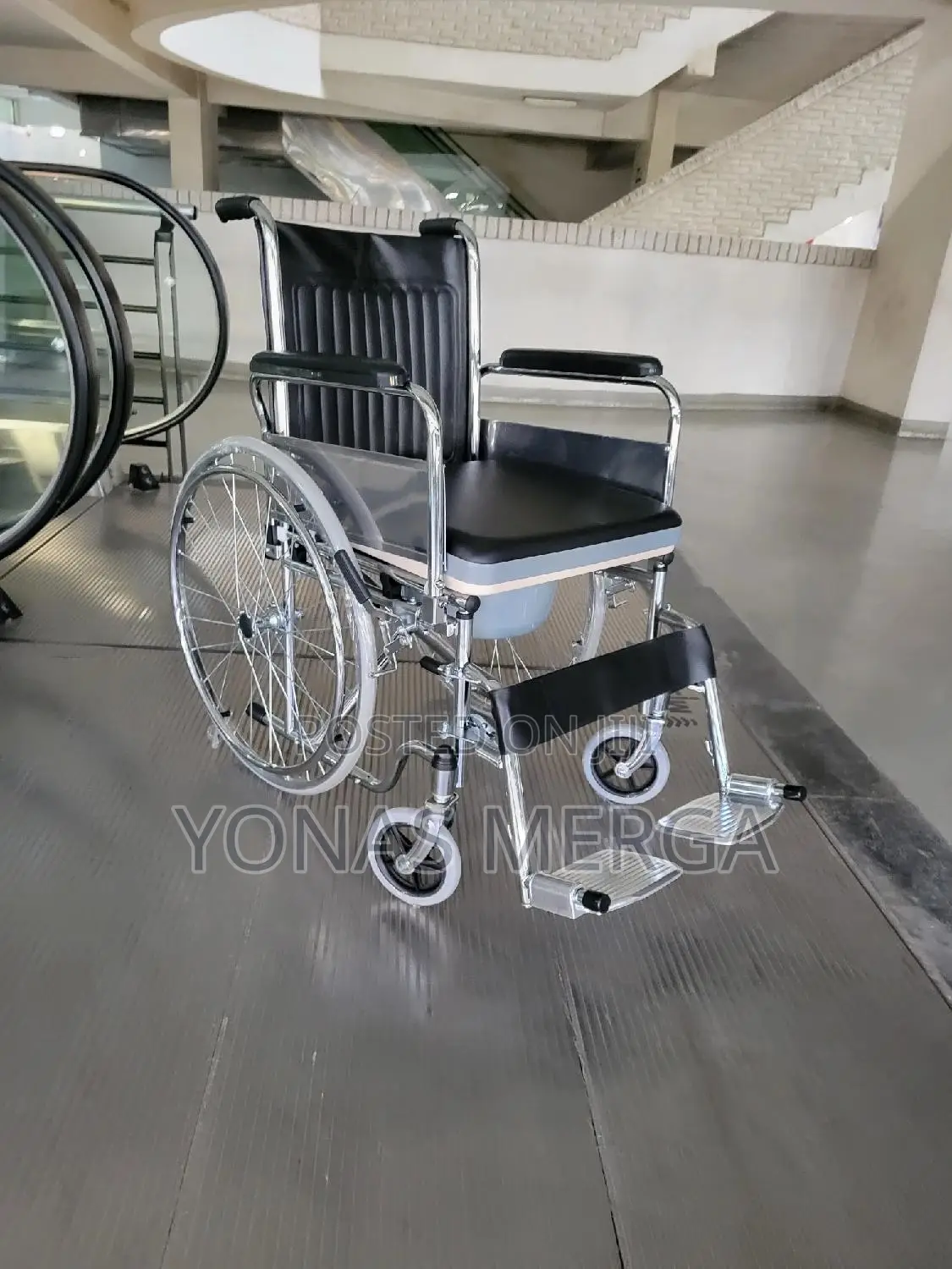 Compact and Comfortable Toilet Wheelchair for Easy Mobility