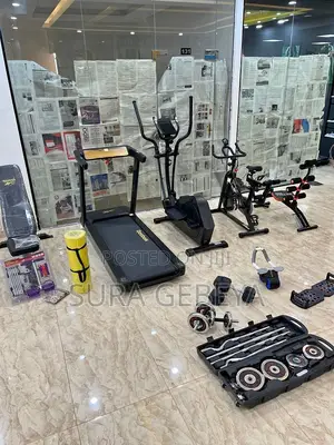 Photo - Treadmills and Dumbbells Home Sport Equipment