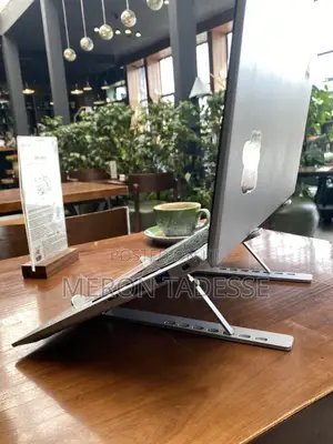 ለኣይኖ የሚመች የኣይን ከፍታ ላይ Pcዎን እንዲያስቀምጡ የሚረዳ Laptop Stand