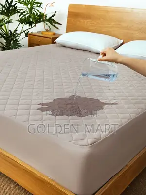 Photo - Waterproof Bed Cover