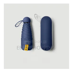 Photo - Mini Pocket Uv Umbrella–Compact Portable Sun Rain Shield