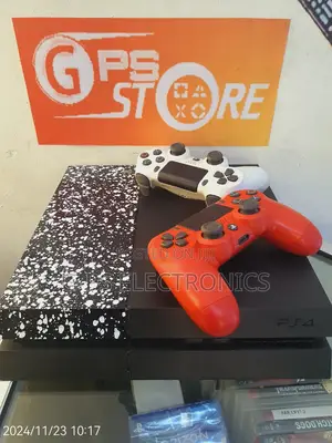 Photo - Ps 4 With 5 Games Installed 500 Gb #