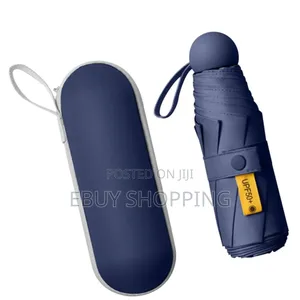 Photo - **Ultra-Portable Umbrella – Perfect for on-the-Go Protection