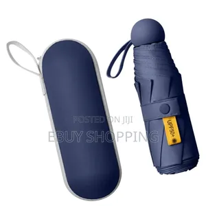 Photo - **On-the-Go Umbrella – Small but Strong Protection**