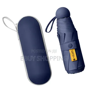 Photo - **Portable Umbrella With Uv Shield – Stay Safe Anywhere**