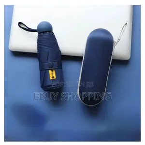 **Travel Essential – Compact Umbrella for Sun Rain**