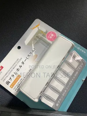 Photo - ጥርስ ቡርሽ ማስቀመጫ Wall-Mounted Toothbrush Holder, 6 Toothbrushes