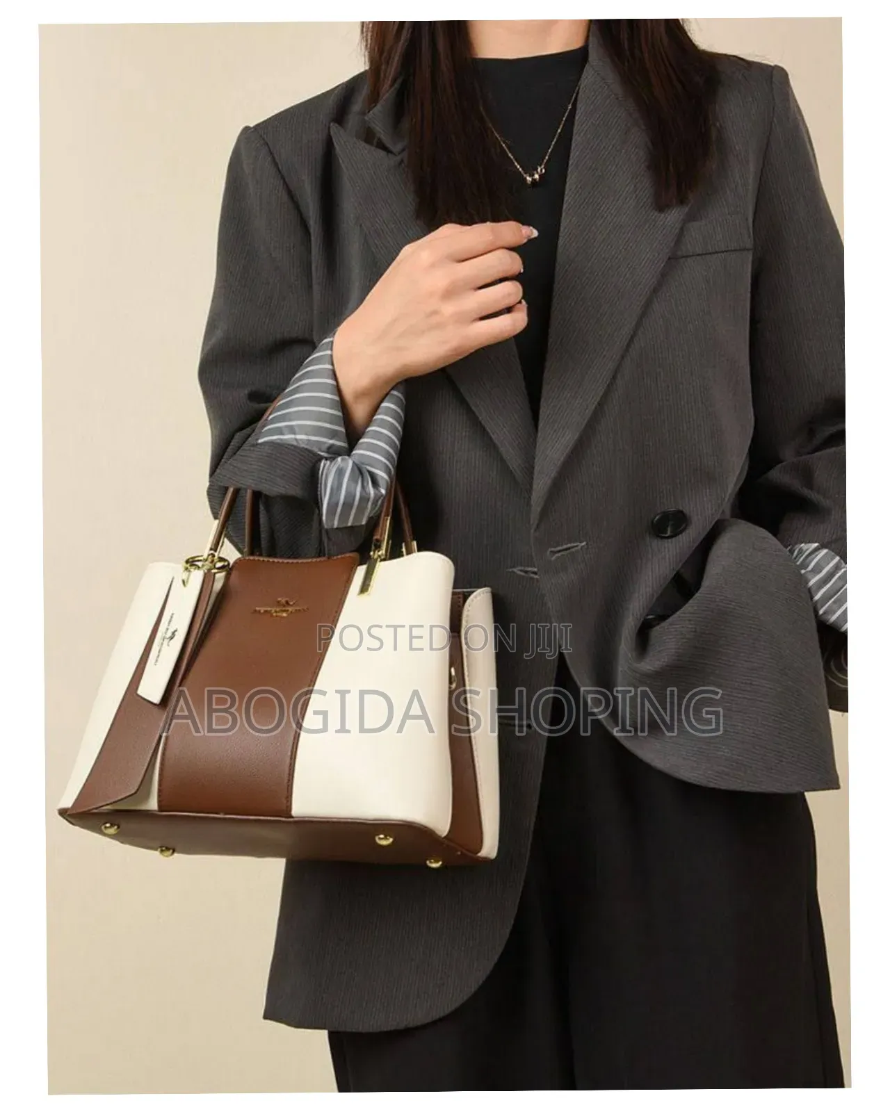 Sophisticated Women’S Handbag With Charm