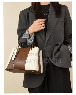 Sophisticated Women’S Handbag With Charm