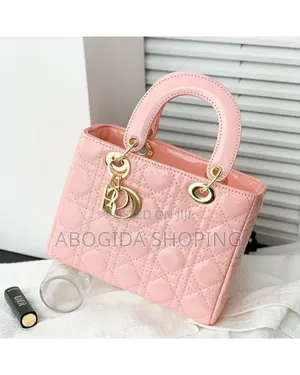 Photo - Elegant Designer Handbag With Gold Accents