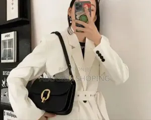 Photo - Modern Women’S Handbag With Unique Charm