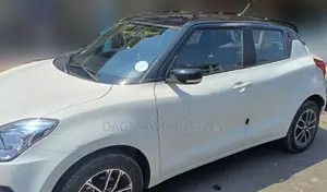 Photo - Suzuki Swift 2022 White