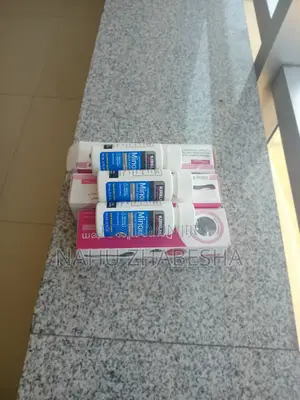 Kkkirklannd Minoxiddll