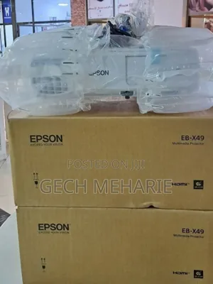 Photo - Brand New EPSON Projector
With Manual CD and Cart