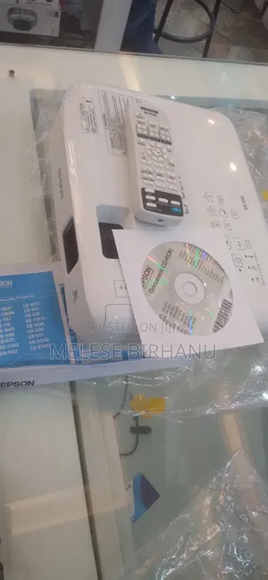 Photo - New Brand EB-E01 Projector With Carton