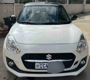 Photo - Suzuki Swift 2023 White