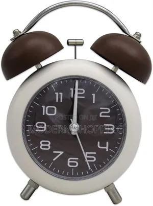 Photo - Compact Quartz Alarm Clock for Home and Travel