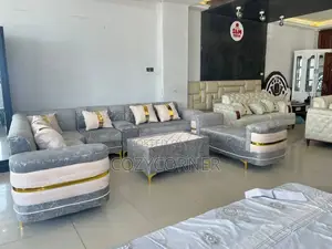 Ultramodern L Shape Sofa Set With Table.