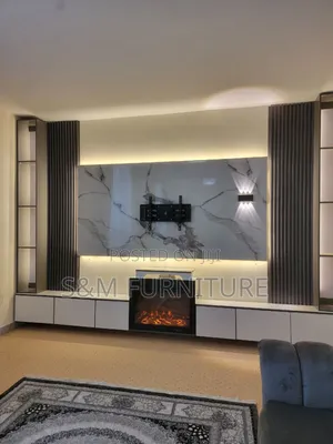 Tv Stand With Fire Place Valued Per Square Meter.