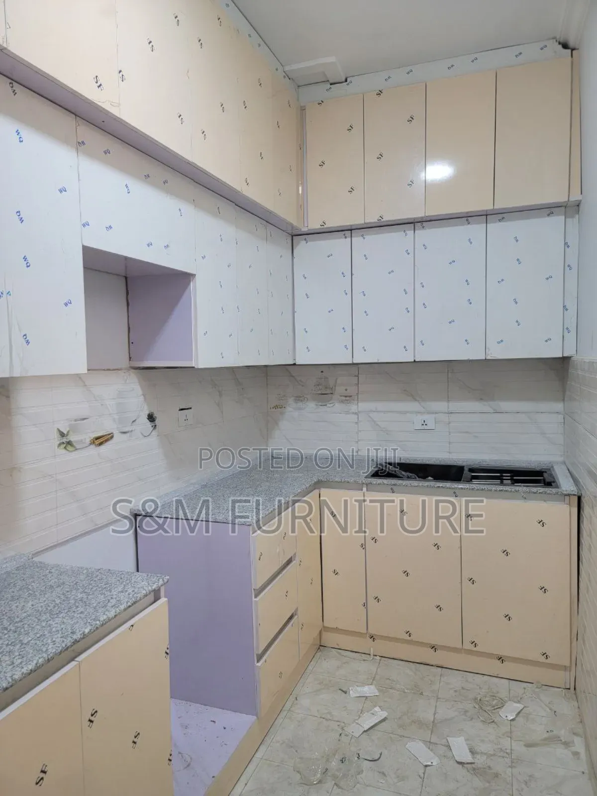 Multi Coloured Kitchen Cabinet Priced Per Square Meter.