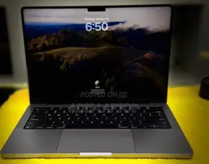 Photo - New Apple MacBook Pro 2023 M3 14-Inch 8GB Apple M3 Pro SSD 512GB