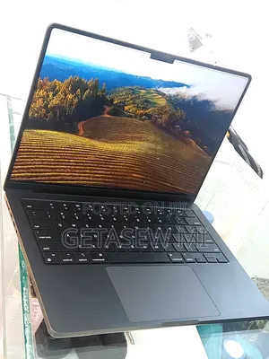 Photo - New Apple MacBook Pro 2023 M3 14-Inch 18GB Apple M3 Pro SSD 512GB