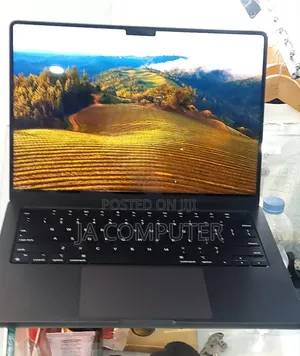 Photo - New Apple MacBook Pro 2023 M3 14-Inch 18GB Apple M3 Pro SSD 512GB