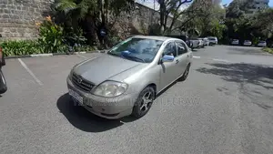 Photo - Toyota Corolla 2003 Beige