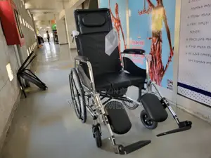 Photo - Wheelchair Portable Bedside Commode