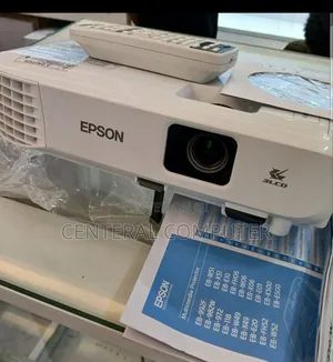 Photo - Epson Projector BRAND NEW With Cartoon Model Name: EB-