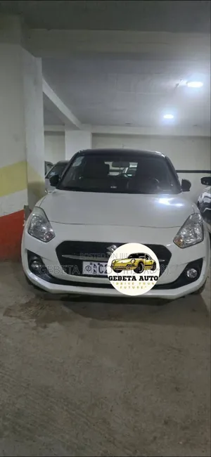Photo - Suzuki Swift 2022 White