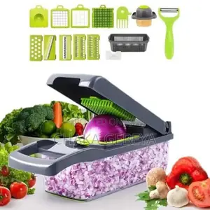 Photo - የተለያዩ አትክልቶችን መክተፊያ