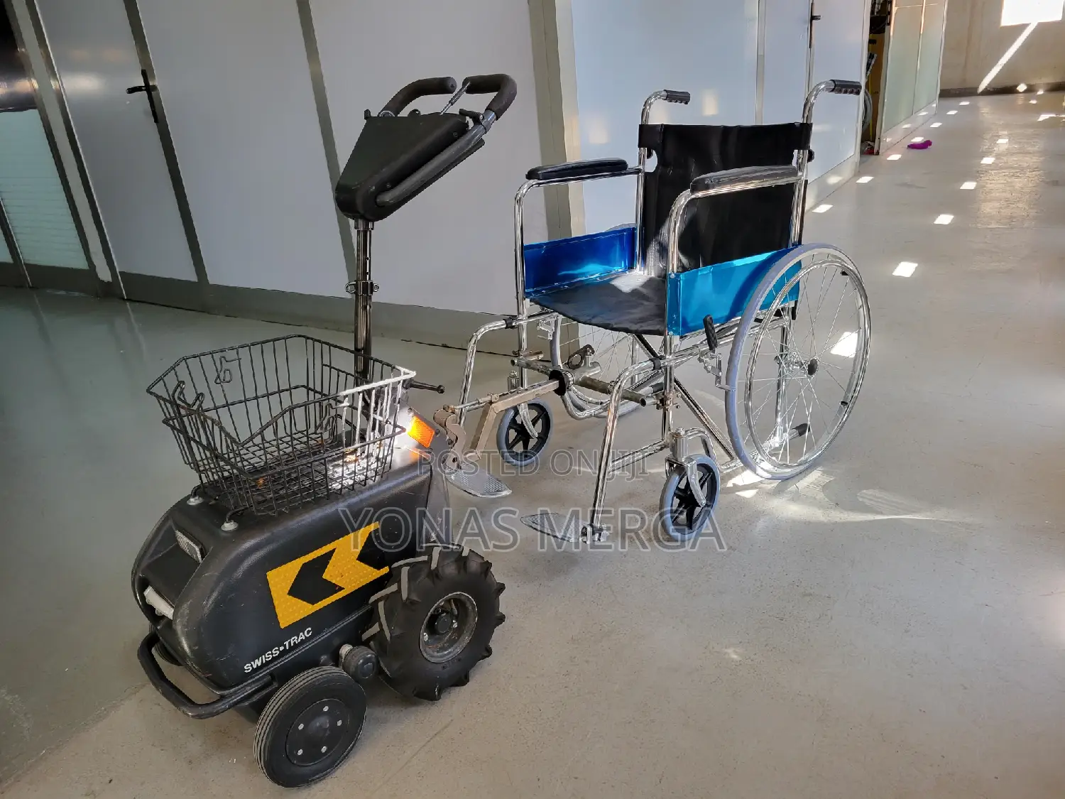 Electric Swiss-Trac Wheelchair龜ቻርጅ ተደርጎ መጎተቻ/Wheelchair