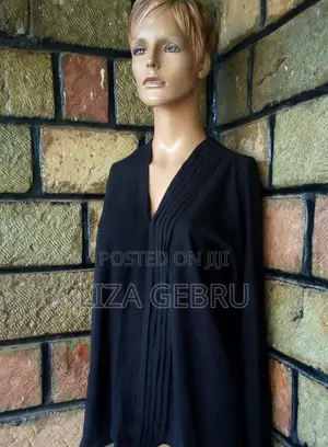 Photo - አንደኛ ደረጃ ቦንዳ ሸሚዝ