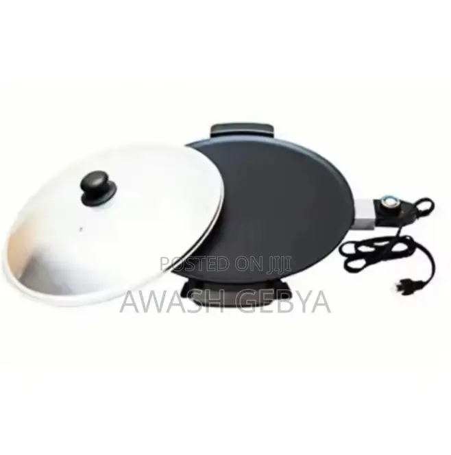 እናት ምጣድ Enat