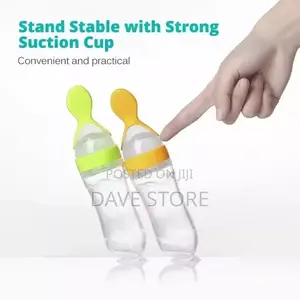 Photo - Silcone Bottle Spoon Feeder