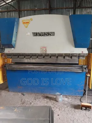 Photo - ላሜራ ማጠፍያ እና መቁረጫ Matal Banding and Cutting Machine