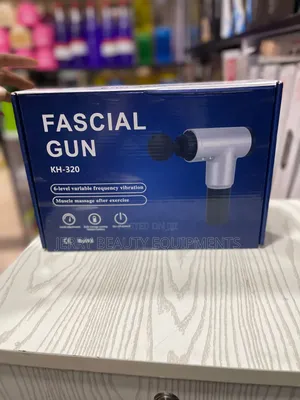 Photo - Fascial Gun Massager 4 In 1
