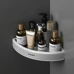 ለባኞ ቤት ተለጣፊ መደርደሪያ Rotating Shelf Organizer