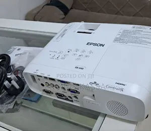 Photo - EPSON Projector
Model Name: EB -X49
Has Bag and Remote