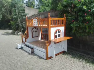 የ ልጆች ተደራራቢ አልጋ በ ዋንዛ የተሰራ