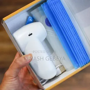 Photo - Zolele Portable Electric Vacuum Sealer(የምግብ ማሸጊያ)