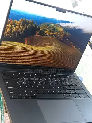 Photo - New Apple MacBook Pro 2023 M3 14-Inch 18GB Apple M3 Pro SSD 512GB