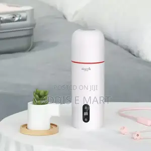 Photo - Deerma Portable Electric Water Bottle