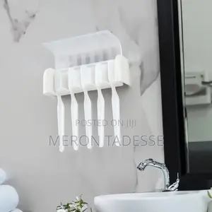 Photo - ጥርስ ቡርሽ ማስቀመጫ Wall-Mounted Toothbrush Holder